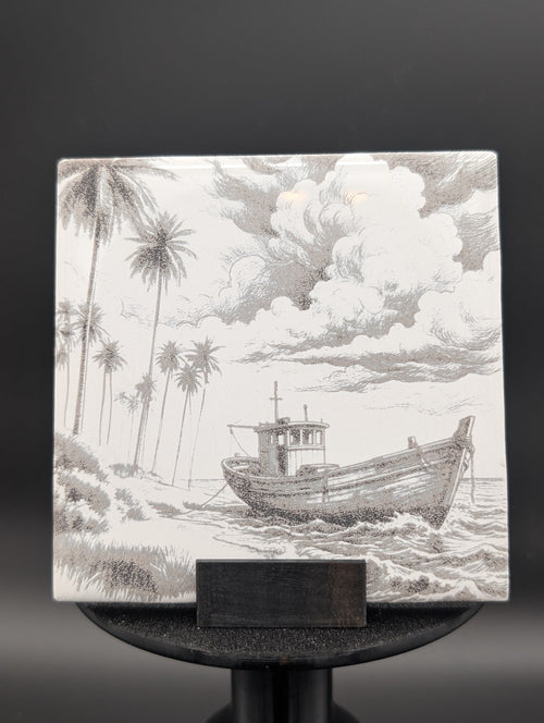 Custom photo tile hero example with boat landscape engraving displayed on stand