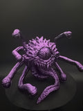 Front view of purple and black one-eyed creature dice tower [Black Purple] [General]