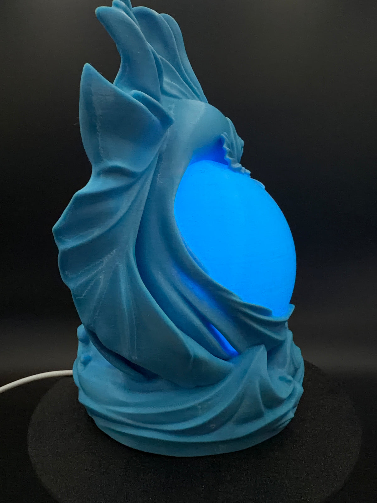 Blue Betta lamp rear view with USB cable