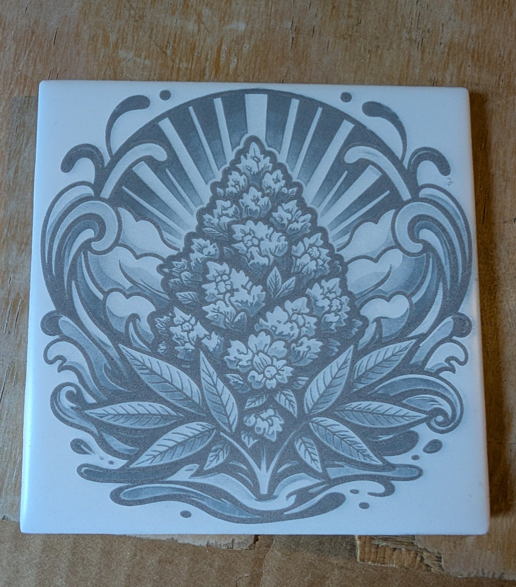 Custom photo tile example with engraved boat landscape on square display tile