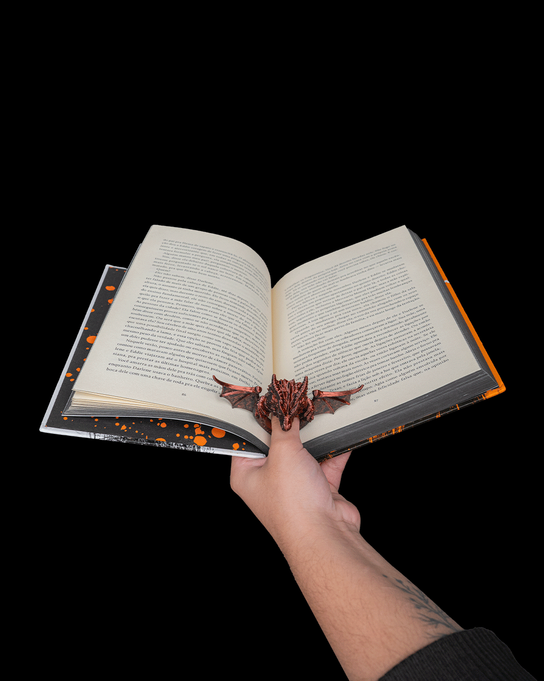 Dragonwing Page Holder shown holding open a book