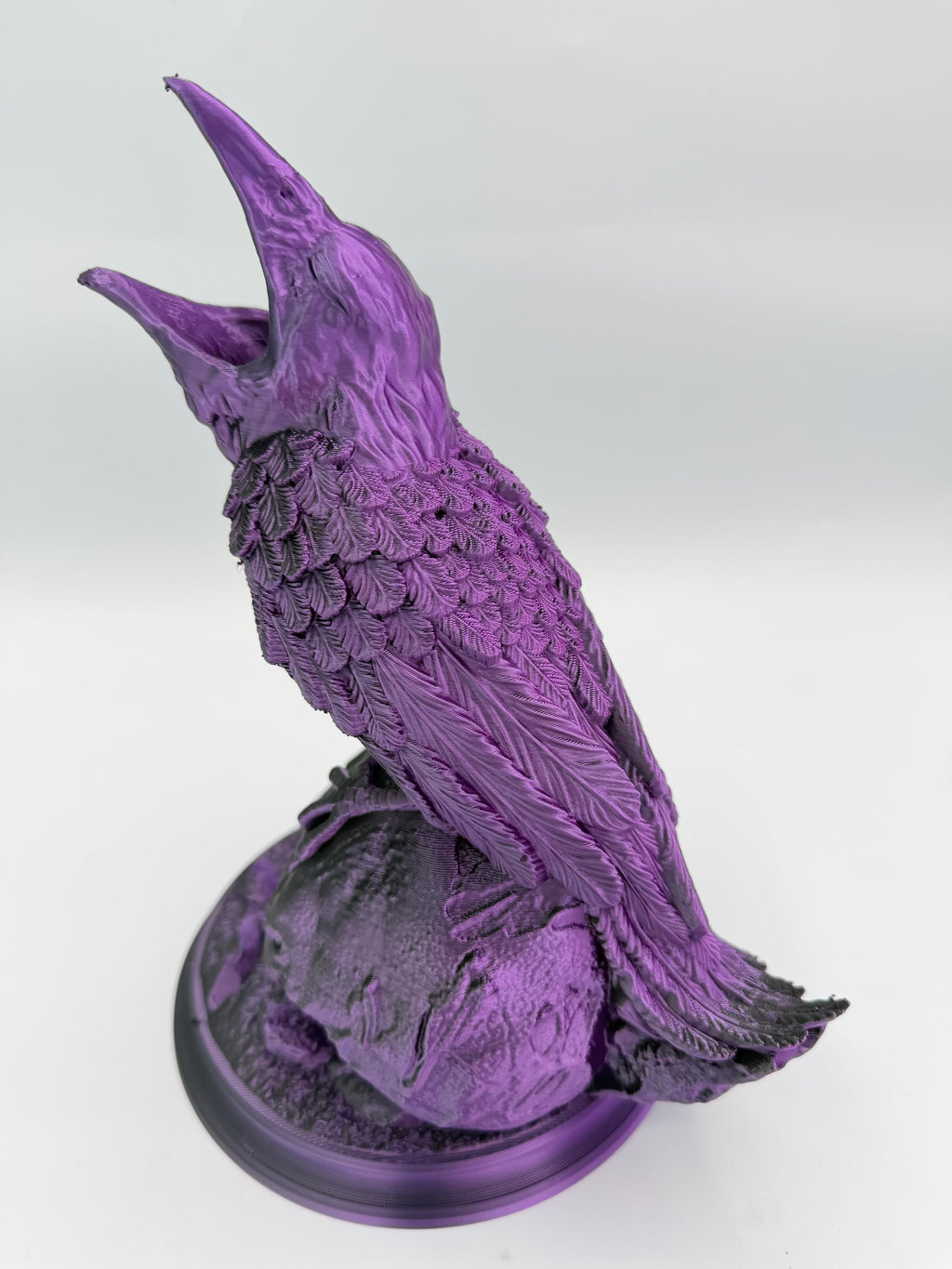 Hollow Crow dice tower – Black Purple – side view of the raised head
