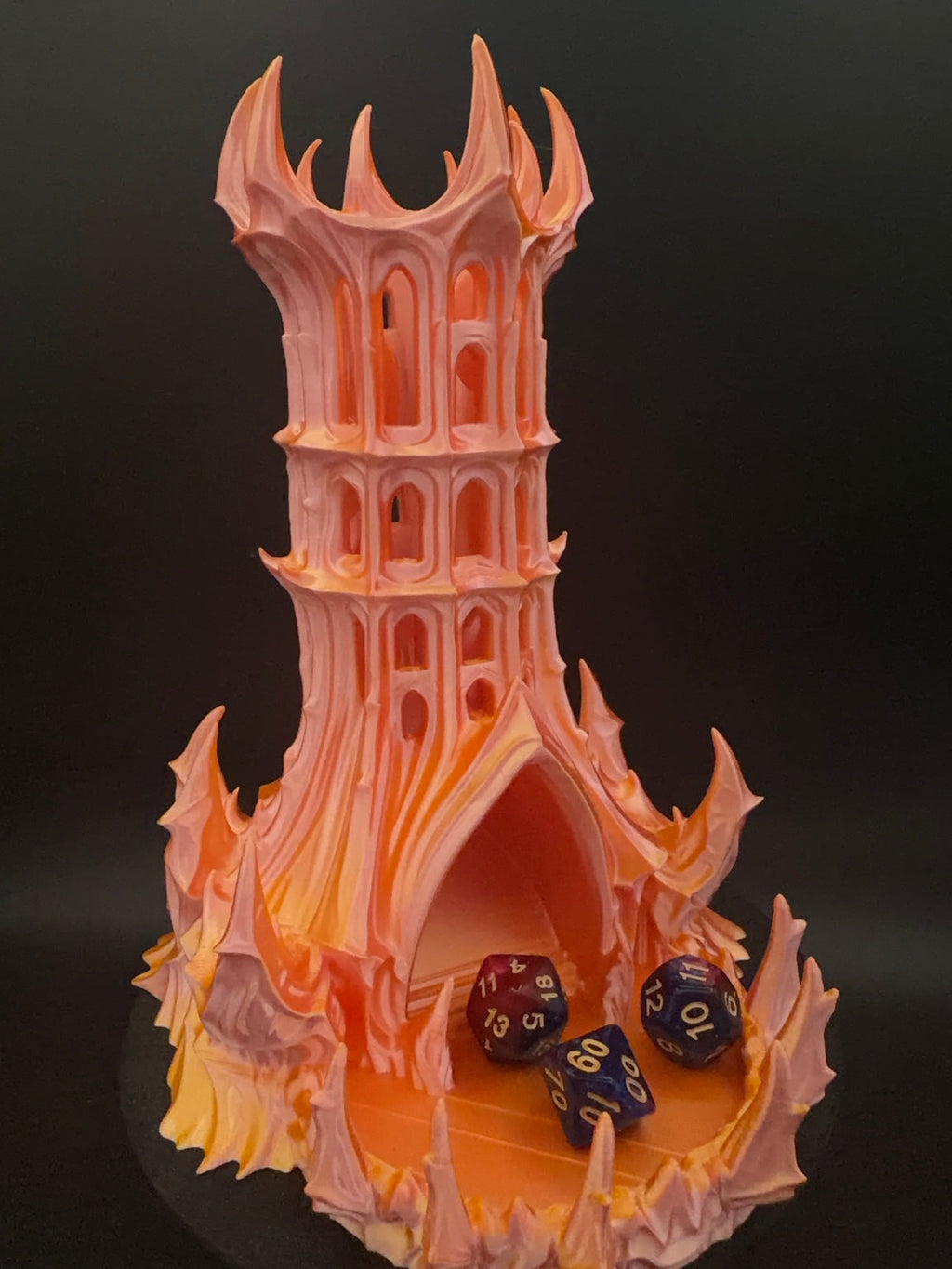 Gold and pink Obsidian Citadel with dice in the tray