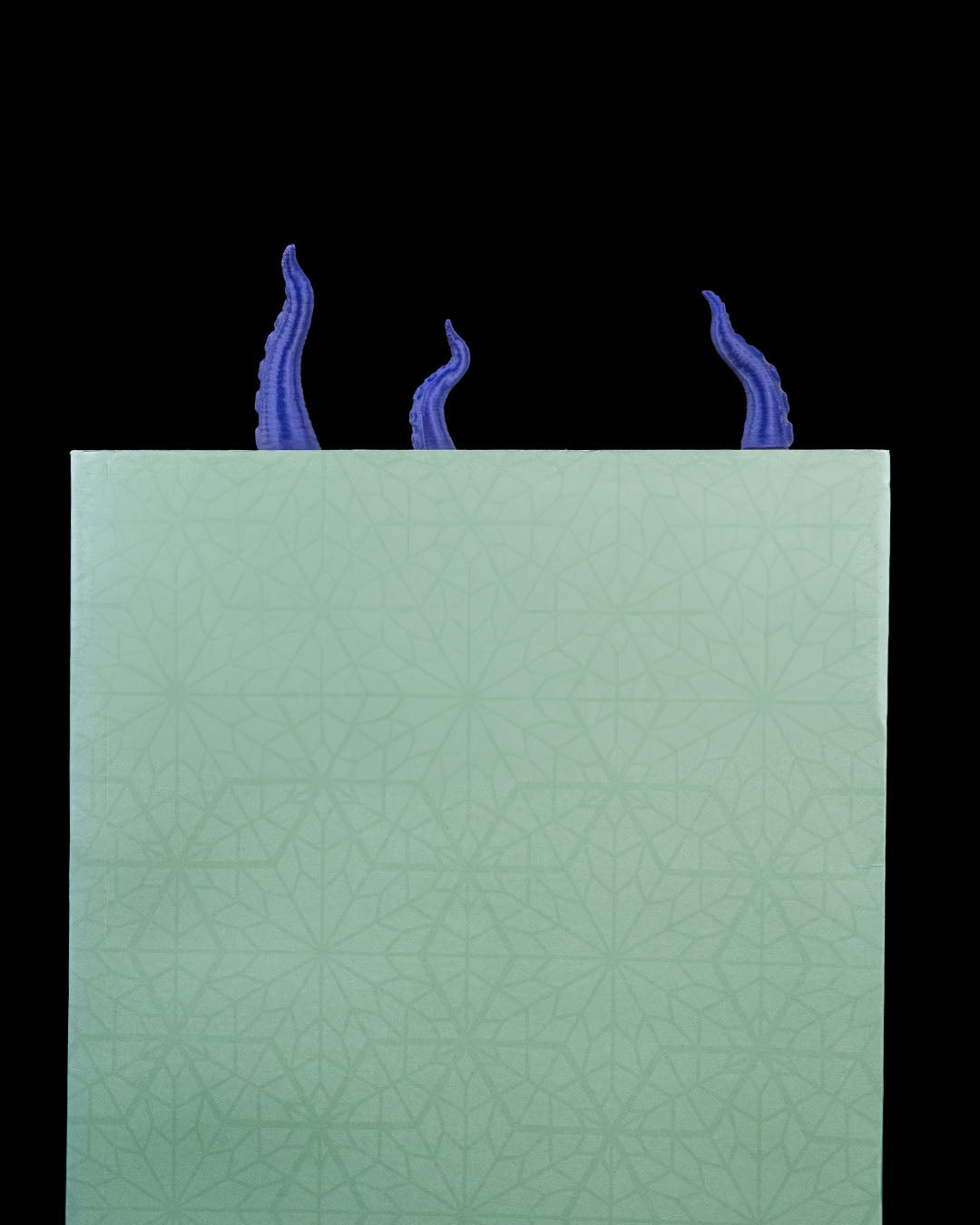 Blue collectible bookmark displayed behind a book cover