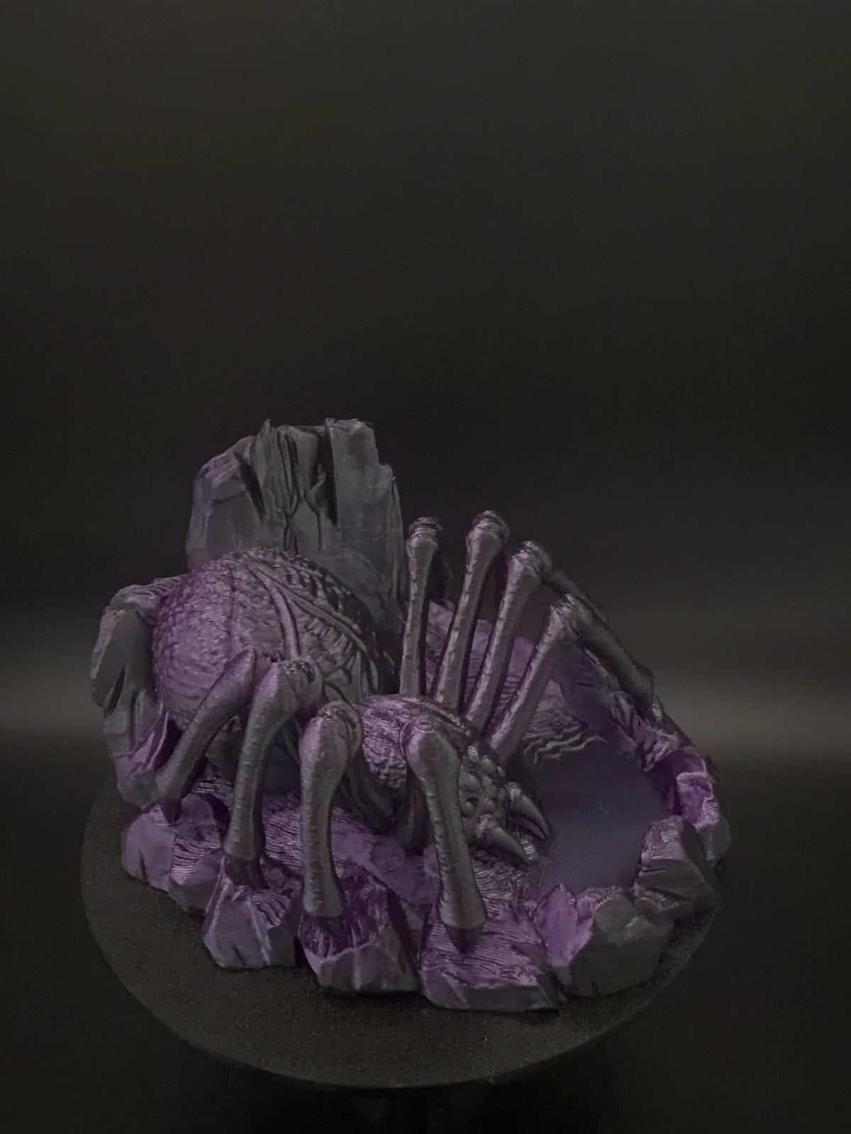 Side view of spider dice tower