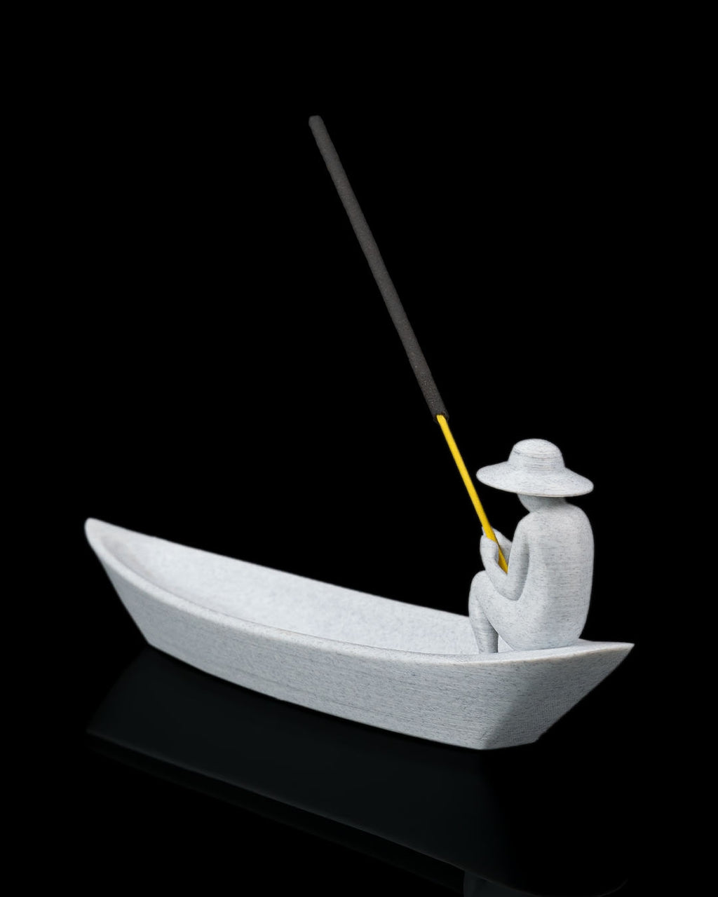 Still Waters incense holder rear angled view showing seated figure and long boat-shaped ash tray