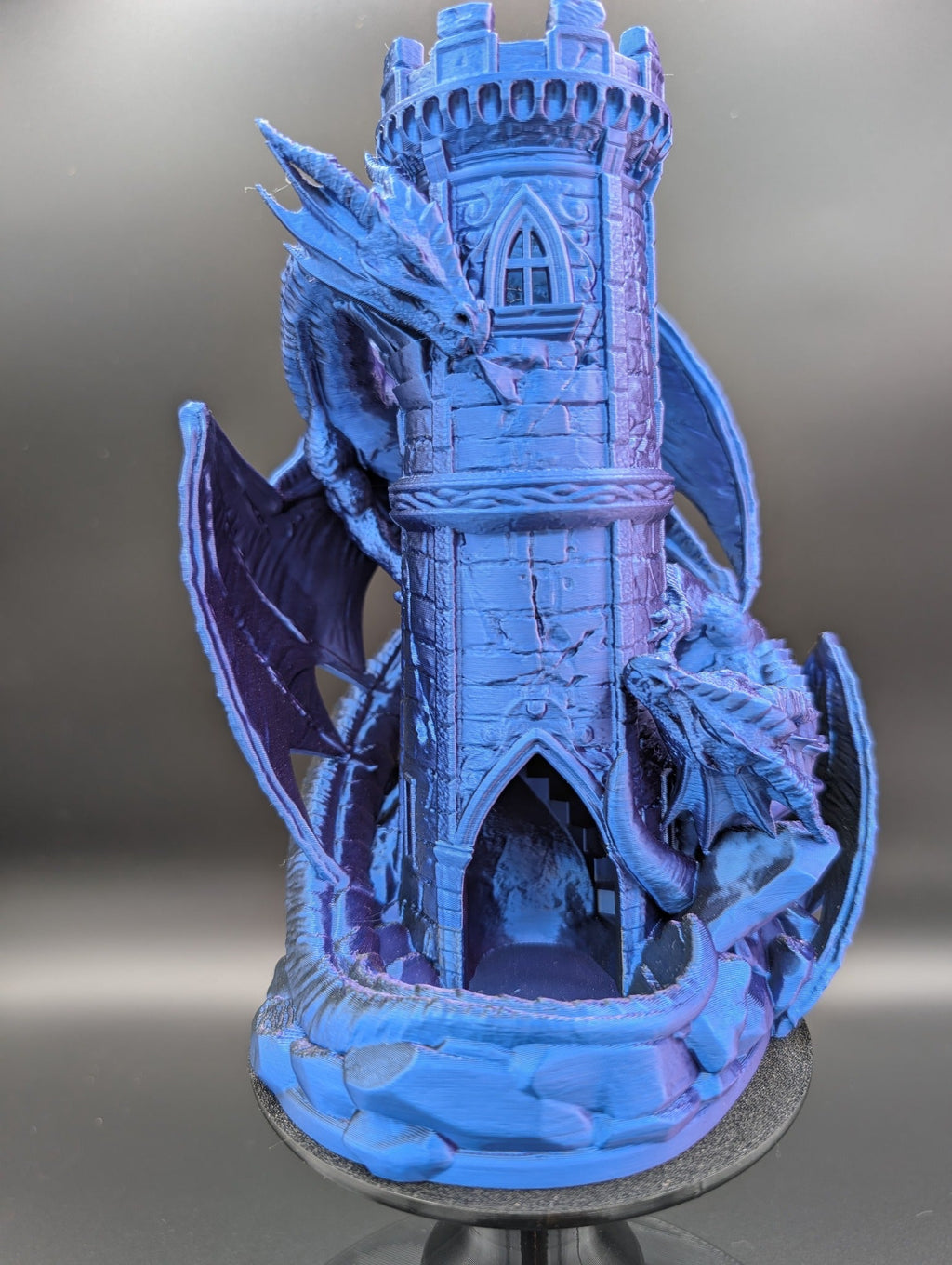 Blue and purple dragon dice tower studio-made tabletop piece photographed close up