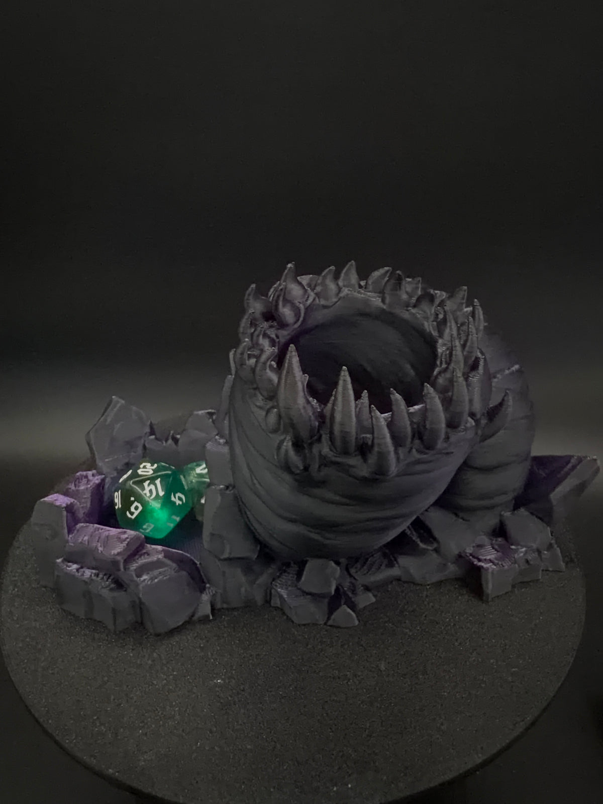 Toothed top opening of purple and black creature dice tower [Black Purple]
